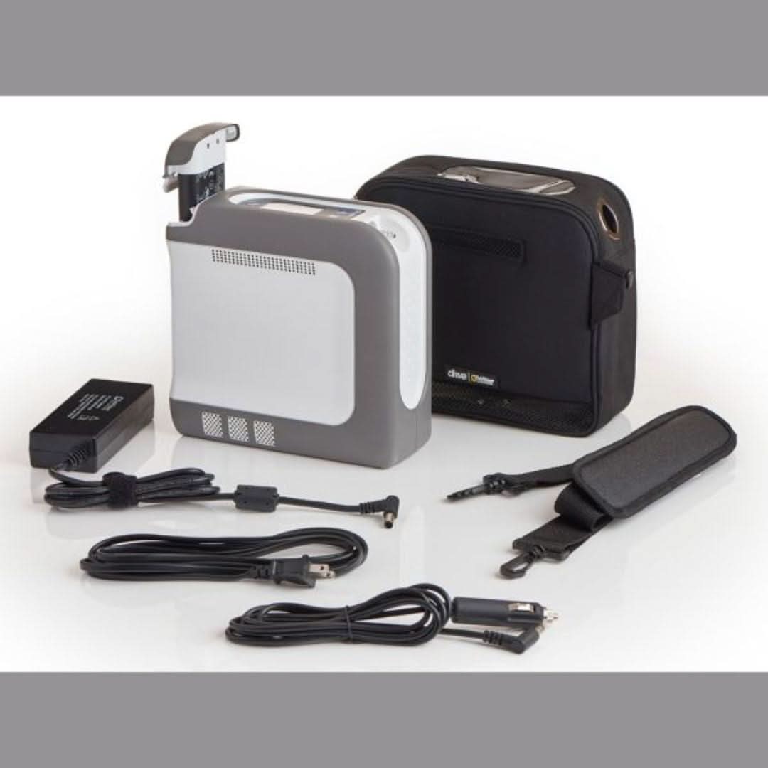 Drive DeVilbiss iGo2 Portable Oxygen Concentrator Bundle with Pulse Dose Technology, featuring SmartDose Technology, lightweight design, and FAA compliance for easy travel.