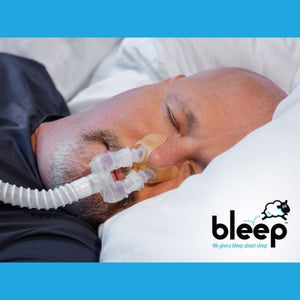 Bleep DreamWay CPAP Interface Starter Kit featuring a mask-free design with adhesive DreamPorts for a secure, leak-free fit. Includes DreamWay interface, 32 DreamPorts, connector tubing, and a storage pouch for comfortable, hassle-free sleep therapy