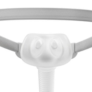 Close-up view of the Fisher & Paykel F&P Solo Nasal Pillow CPAP Mask showing soft silicone nasal pillow cushion, AutoFit headgear, and lightweight minimalist design for sleep apnea therapy.