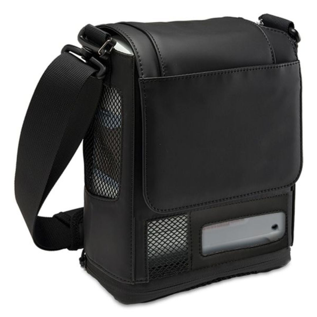 Black neoprene Inogen One G4 Carry Bag with mesh panels for ventilation, clear quick-view portal, and openings for power cord and oxygen outlet port.